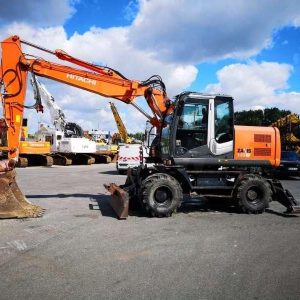 Pelle sur pneus HITACHI ZX140W-3
