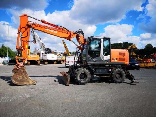Pelle sur pneus HITACHI ZX140W-3