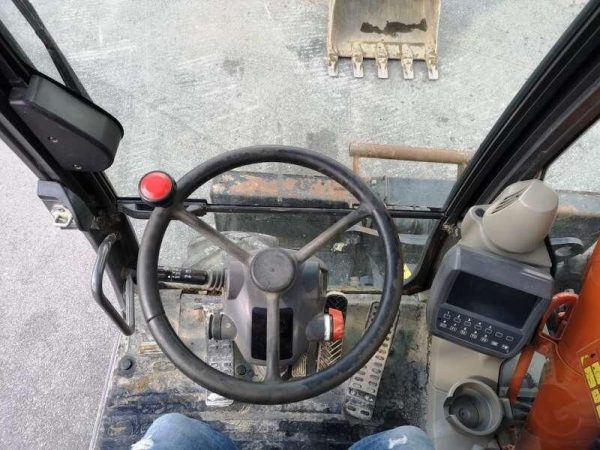 Pelle sur pneus HITACHI ZX140W-3 – Image 10