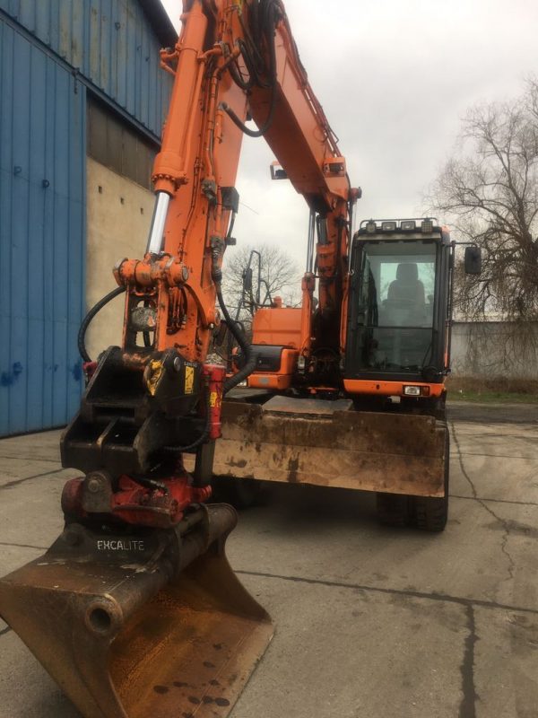 Pelle sur pneus DOOSAN DX140W Rototilt – Image 4